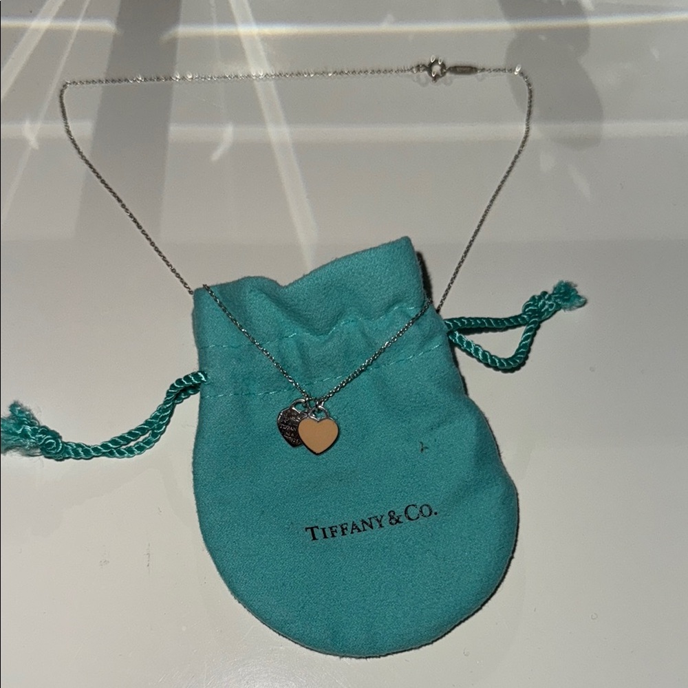Tiffany & Co. Silver Necklace with Gold Heart Pendant